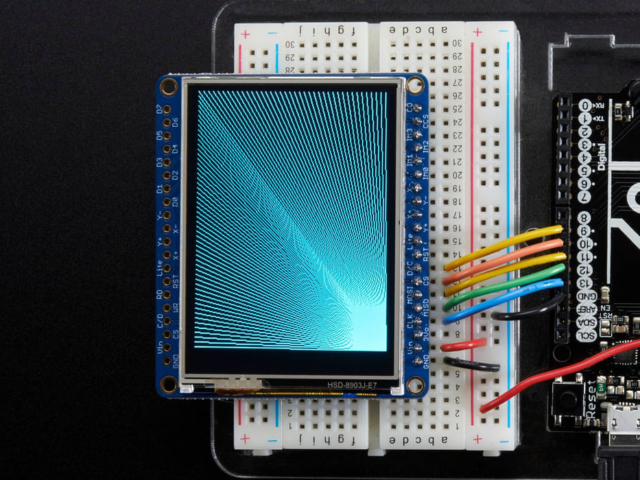 TFT breakout wired to arduino, hand doodling of a flower and a sun using touchscreen