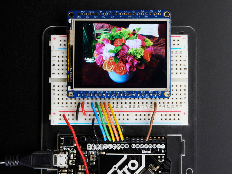 TFT breakout wired to arduino, hand doodling of a flower and a sun using touchscreen