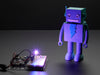 Very bright LED bathing robot figuring in rainbow light