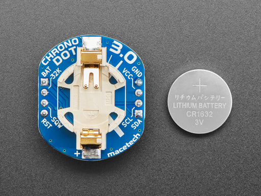 Angled shot of a ChronoDot - Ultra-precise Real Time Clock with a cell battery inserted. 