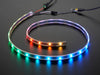 Adafruit NeoPixel Digital RGB LED Strip wired to a microcontroller, with all the LEDs in a rainbow