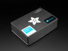 Angled shot of a black box with the white Adafruit star-flower logo.