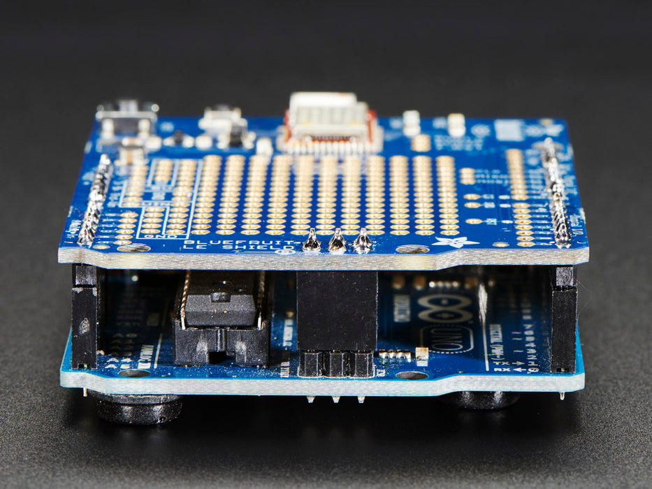 Close up of a Side view of a Adafruit Bluefruit LE Shield - Bluetooth LE for Arduino. 