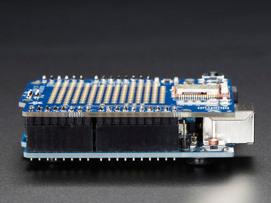 Close up of a Side view of a Adafruit Bluefruit LE Shield - Bluetooth LE for Arduino. 