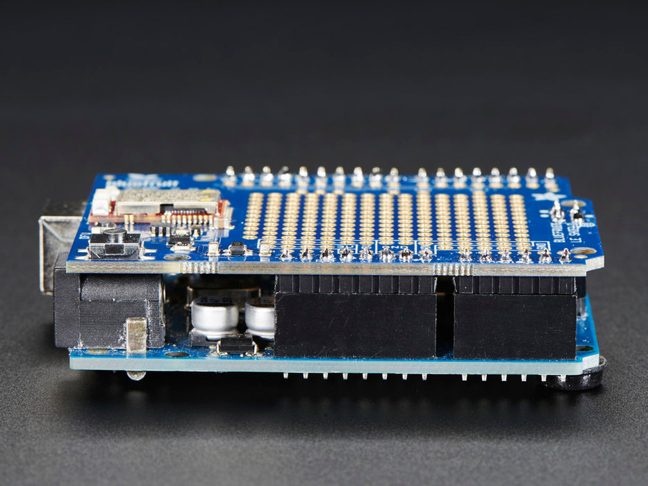 Close up of a Side view of a Adafruit Bluefruit LE Shield - Bluetooth LE for Arduino. 