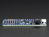 Angled shot of a Adafruit Feather 32u4 Basic Proto. 