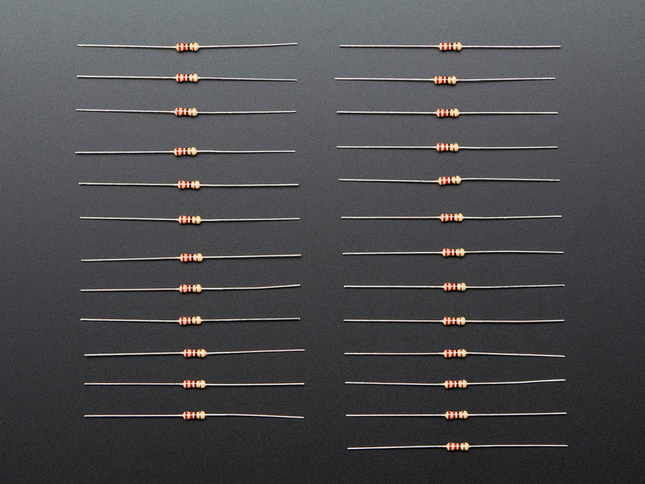 Angled shot of 25 Through-Hole Resistors - 220 ohm 5% 1/4W.