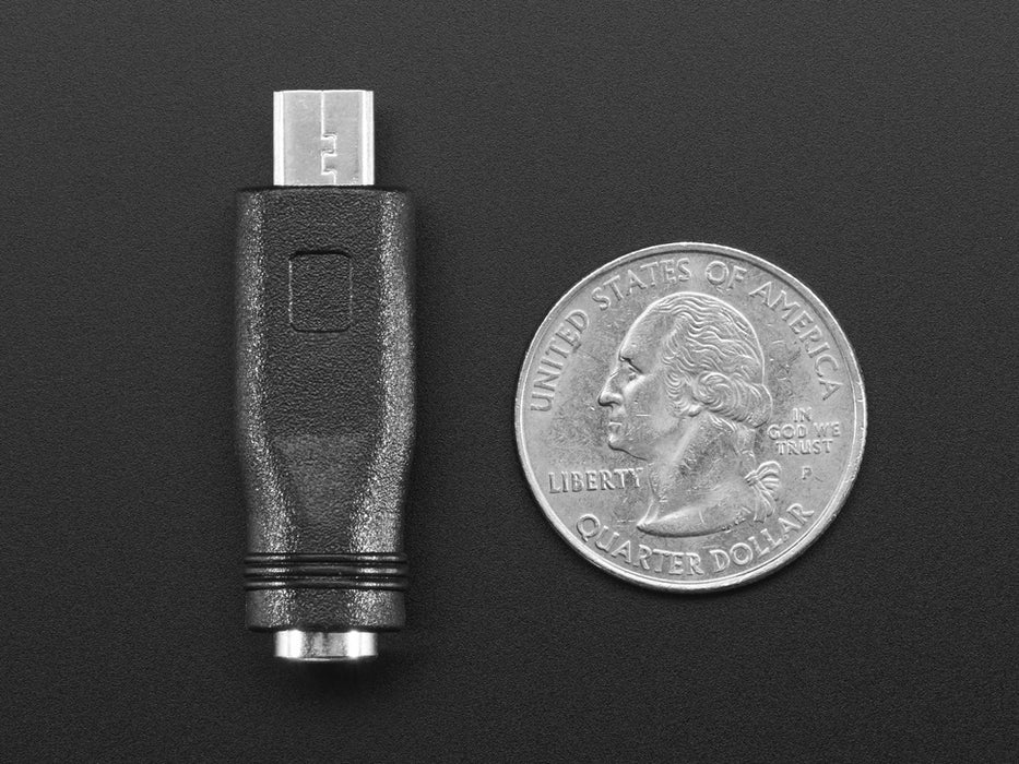 Angled shot of a MicroUSB to 5.5/2.1mm DC Barrel Jack Adapter showing DC Barrel Jack end.