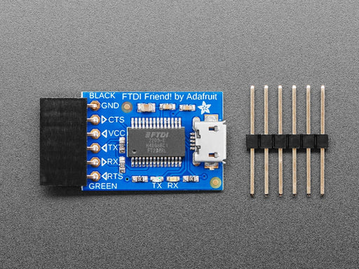 Angled shot of blue rectangular FTDI breakout board.