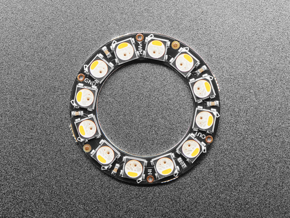 NeoPixel Ring with 12 x 5050 RGBW LEDs lighting up rainbow and white