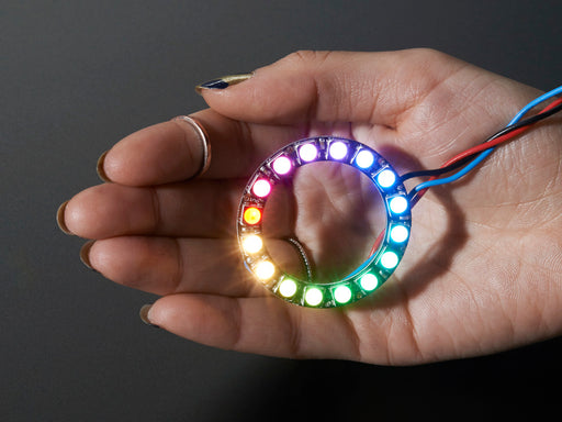 NeoPixel Ring with 16 x 5050 RGBW LEDs lighting up rainbow and white