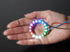 NeoPixel Ring with 16 x 5050 RGBW LEDs lighting up rainbow and white