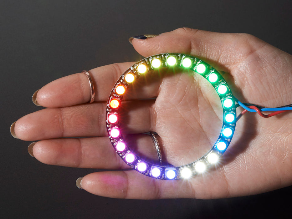 NeoPixel Ring with 24 x 5050 RGBW LEDs lighting up rainbow and white