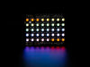 Adafruit NeoPixel Shield for Arduino - 40 RGB LED Pixel Matrix lit up rainbow and warm white.