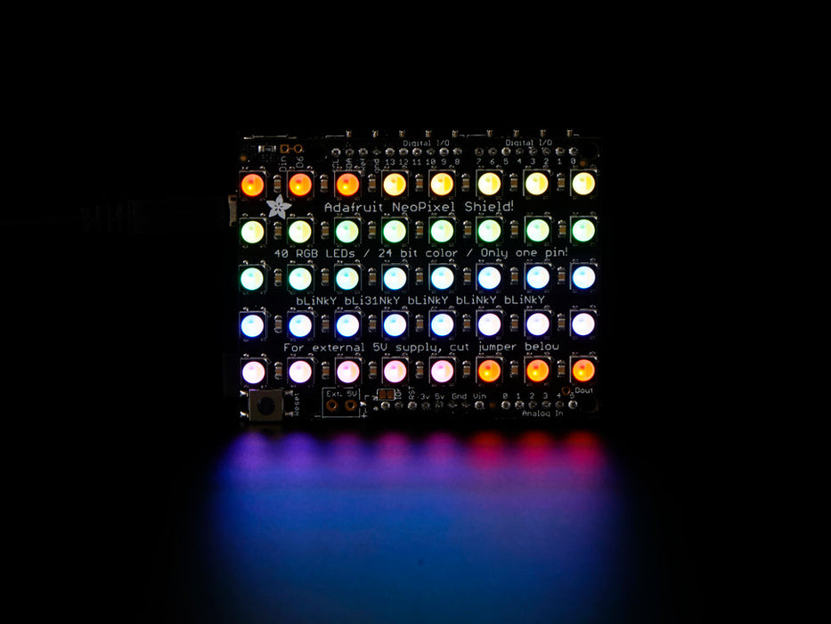 Adafruit NeoPixel Shield for Arduino - 40 RGB LED Pixel Matrix lit up rainbow and warm white.