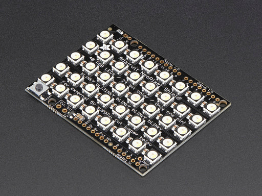 Adafruit NeoPixel Shield for Arduino - 40 RGB LED Pixel Matrix lit up rainbow and white