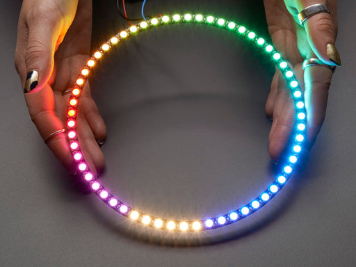 NeoPixel Ring with 60 x 5050 RGBW LEDs lighting up rainbow and white