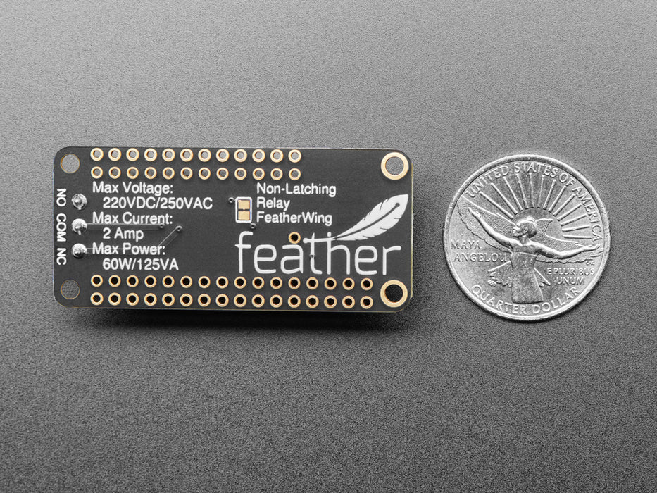 Angled shot of an Adafruit Non-Latching Mini Relay FeatherWing. 
