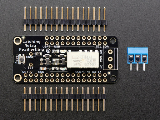 Angled shot of a Adafruit Non-Latching Mini Relay FeatherWing. 
