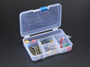 Two hands holding Latching 5-Compartment Storage Box full of assorted components