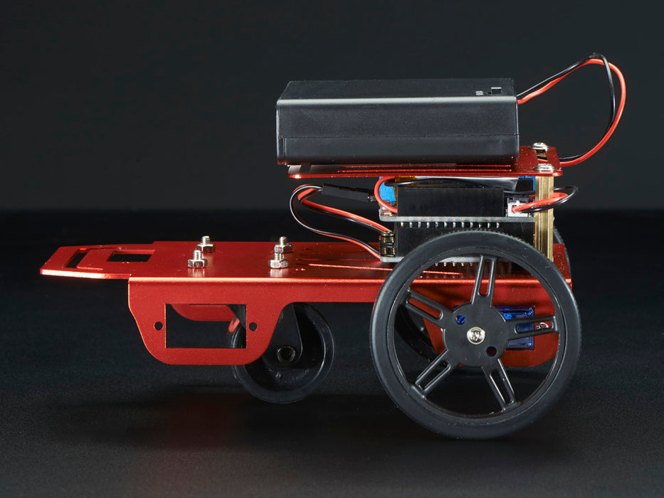 Two-wheeled robot turning around a few times and then driving off.