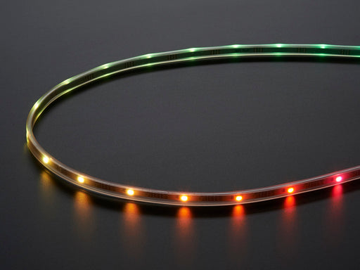 Adafruit NeoPixel Digital RGB LED Strip wired with all the LEDs illuminating various colors. 