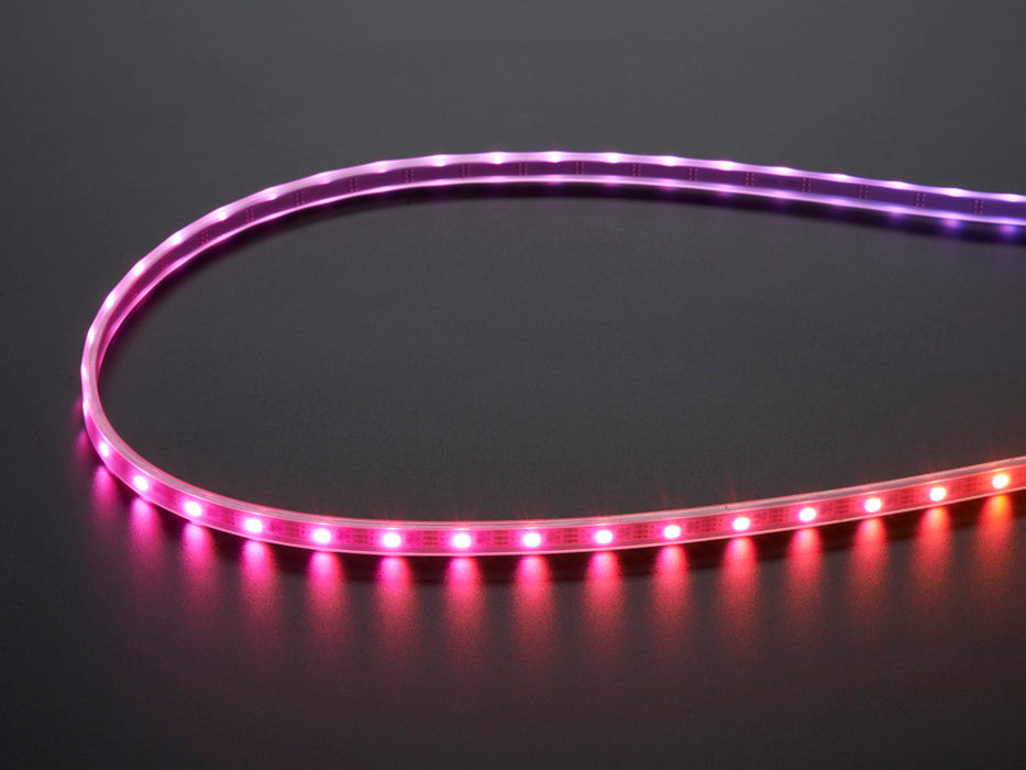 Adafruit NeoPixel Digital RGB LED Strip with all the LEDs lighting in a rainbow pattern.