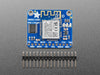 Angled shot of blue, square WiFi breakout board.