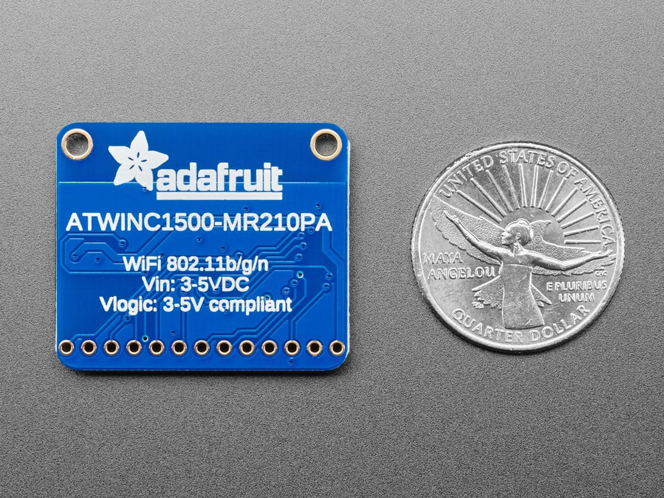 Angled shot of blue, square WiFi breakout board.