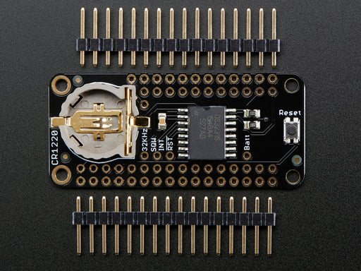 Angled shot of a DS3231 Precision RTC FeatherWing - RTC Add-on For Feather Boards. 