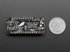 Angled shot of an Assembled Adafruit Feather M0 WiFi with Stacking Headers.