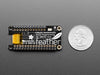 Angled shot of a Assembled Adafruit FeatherWing OLED - 128x32 OLED Add-on For Feather. 