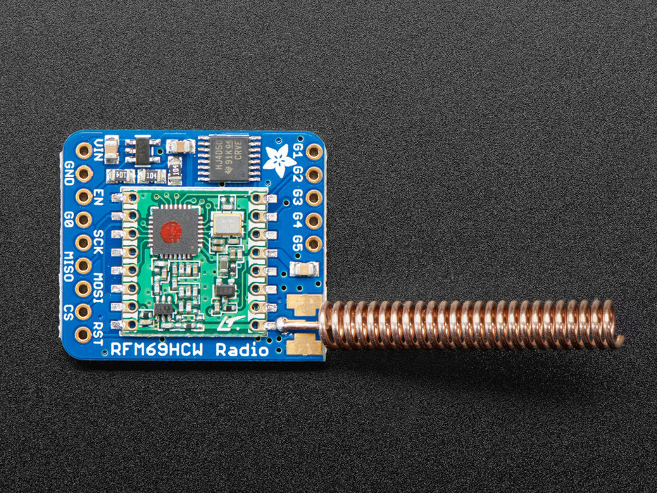 Angled shot of a Adafruit RFM69HCW Transceiver Radio Breakout - 433 MHz. 