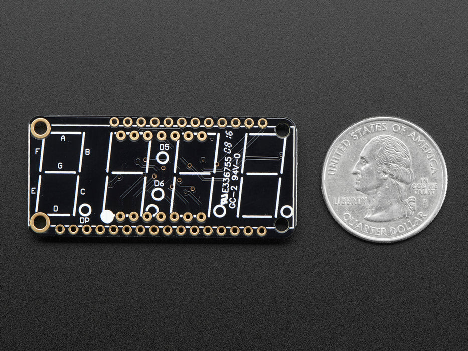 Angled shot of a Adafruit 4-Digit 7-Segment LED Matrix Display FeatherWing. 