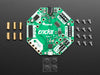 Top down view of a Adafruit CRICKIT for Circuit Playground Express with a circular board connected. 