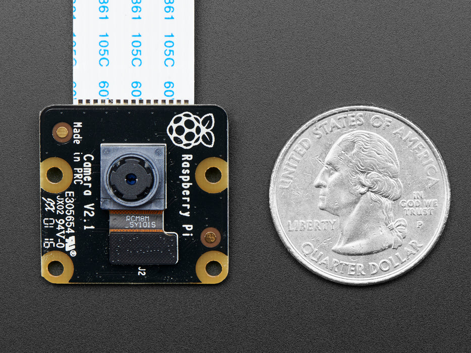 Angled shot of Raspberry Pi NoIR Camera Board v2 - 8 Megapixels connected to a Raspberry Pi via flex cable. 