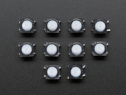 Angled shot of 10 8mm soft tactile buttons.