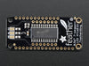 Angled shot of a rectangular shaped 7-segment breakout board with an LED matrix soldered on.