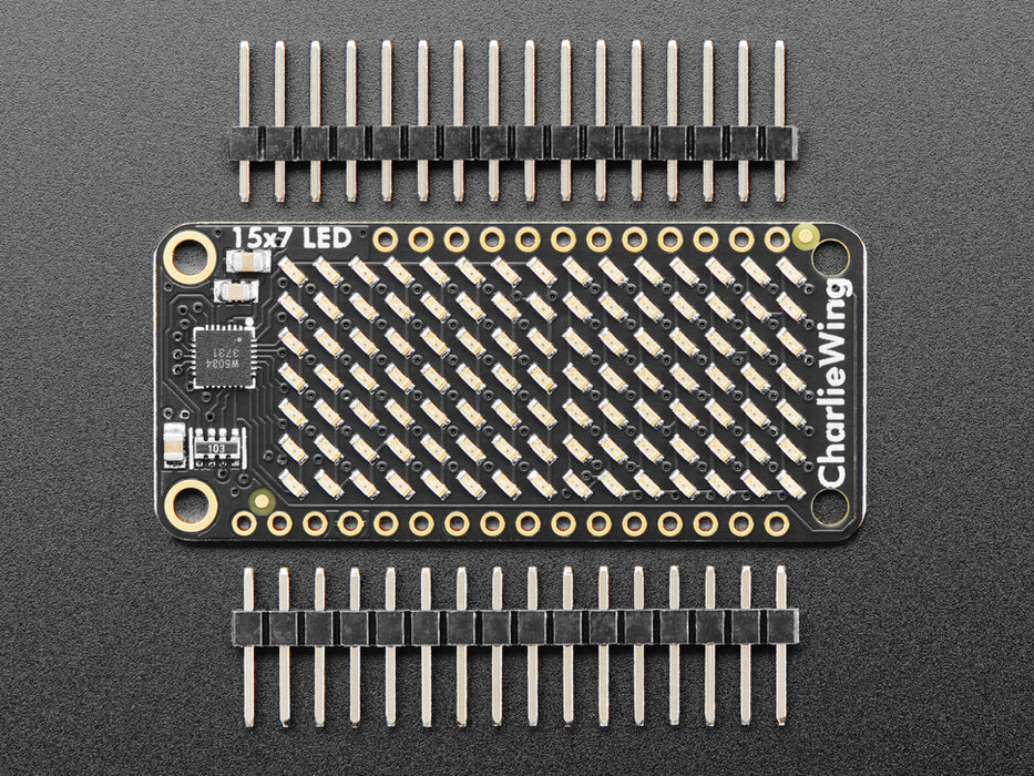 Video of a Adafruit 15x7 CharliePlex LED Matrix Display FeatherWing illuminating Yellow LEDs in a wave like pattern. 