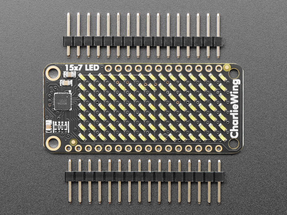 Video of a Adafruit 15x7 CharliePlex LED Matrix Display FeatherWing illuminating Cool White LEDs in a wave like pattern. 