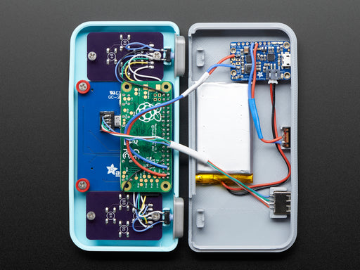 Top down view of components included in a Pi GRRL Zero kit. 