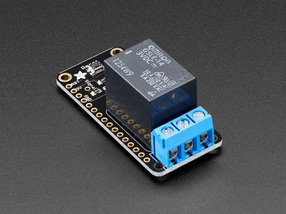 Angled shot of a Adafruit Power Relay FeatherWing. 