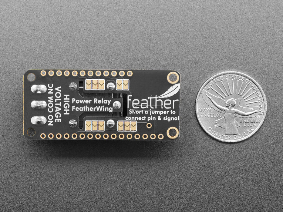 Angled shot of a Adafruit Power Relay FeatherWing. 