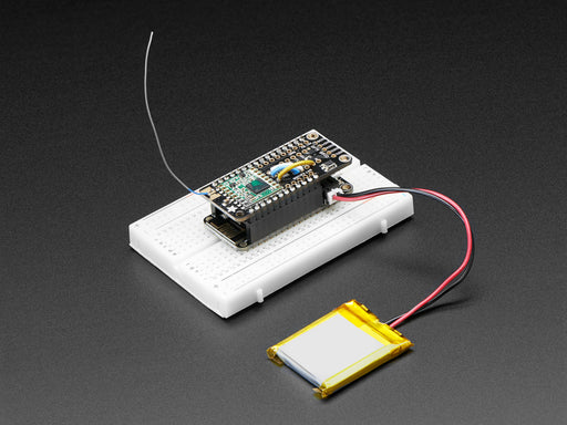 Angled shot of a Adafruit LoRa Radio FeatherWing - RFM95W 900 MHz - RadioFruit.