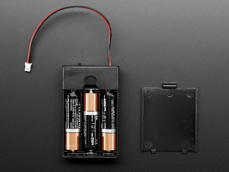 Angled shot of 3 x AA battery holder with on/off switch, JST, and belt clip.