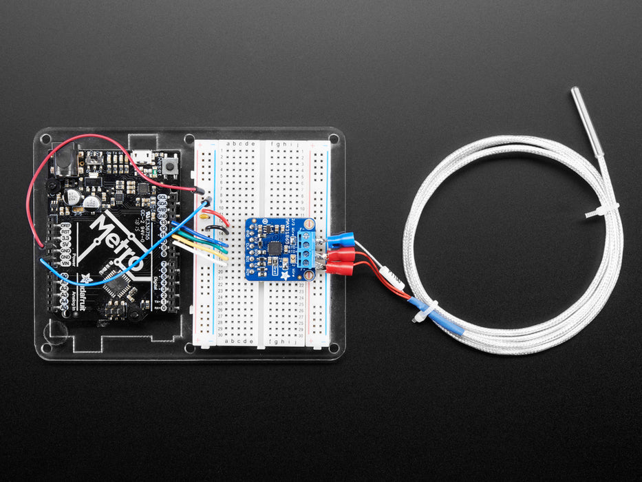 Angled shot of a coiled Platinum RTD Sensor - PT100 - 3 Wire 1 meter long.