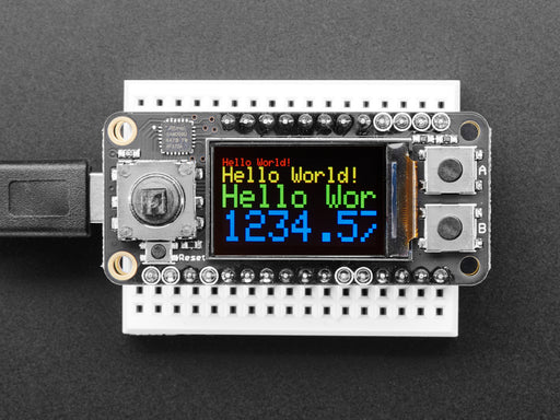 Angled shot of a Adafruit Mini Color TFT with Joystick FeatherWing on a small white breadboard connected to a lithium battery. 