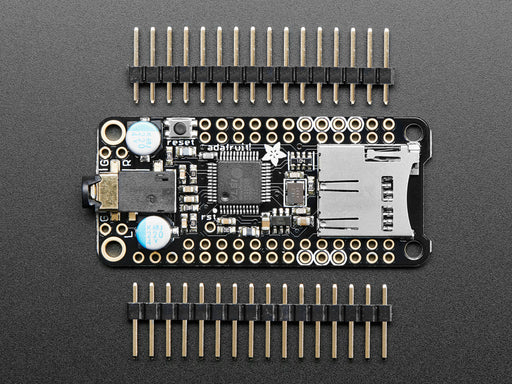 Adafruit Music Maker FeatherWing - MP3 OGG WAV MIDI Synth Player connected to a half sized breadboard and a set of headphones. 