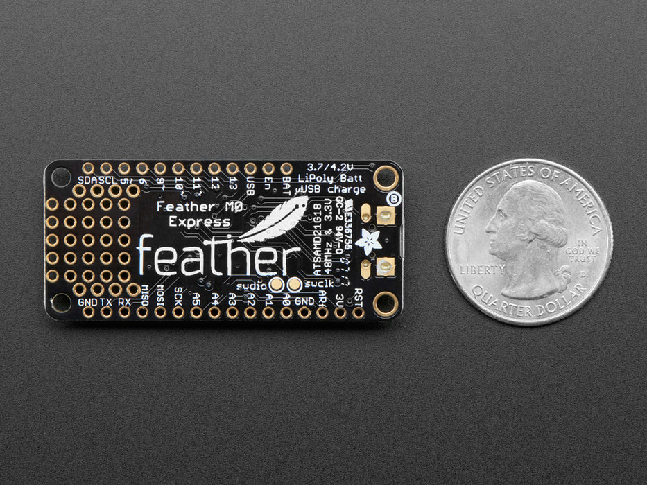 Angled shot of a Adafruit Feather M0 Express - ATSAMD21 Cortex M0. 