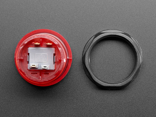 Video of 30mm translucent red LED arcade button flashing on and off.